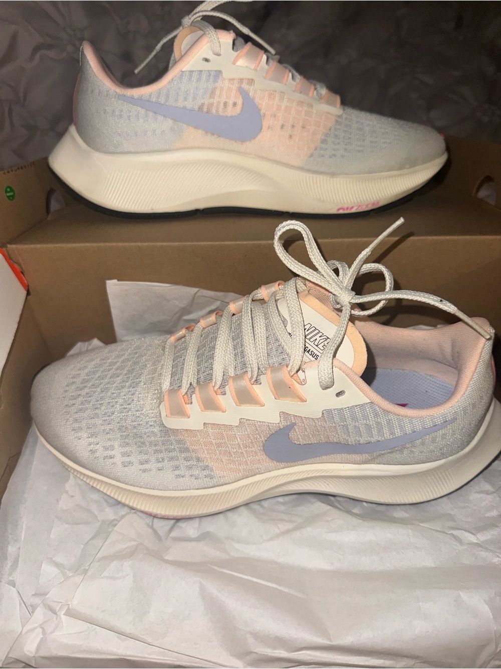Nike Women's Light Gray Running Shoes with Pastel Pink & Lavender Swoosh